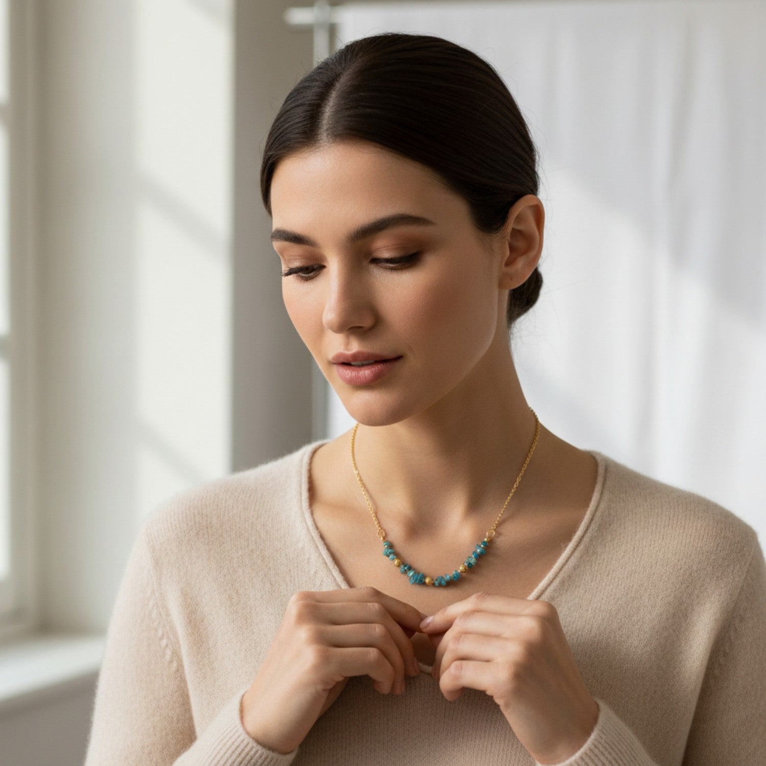 woman wearing a blue apatite necklace.