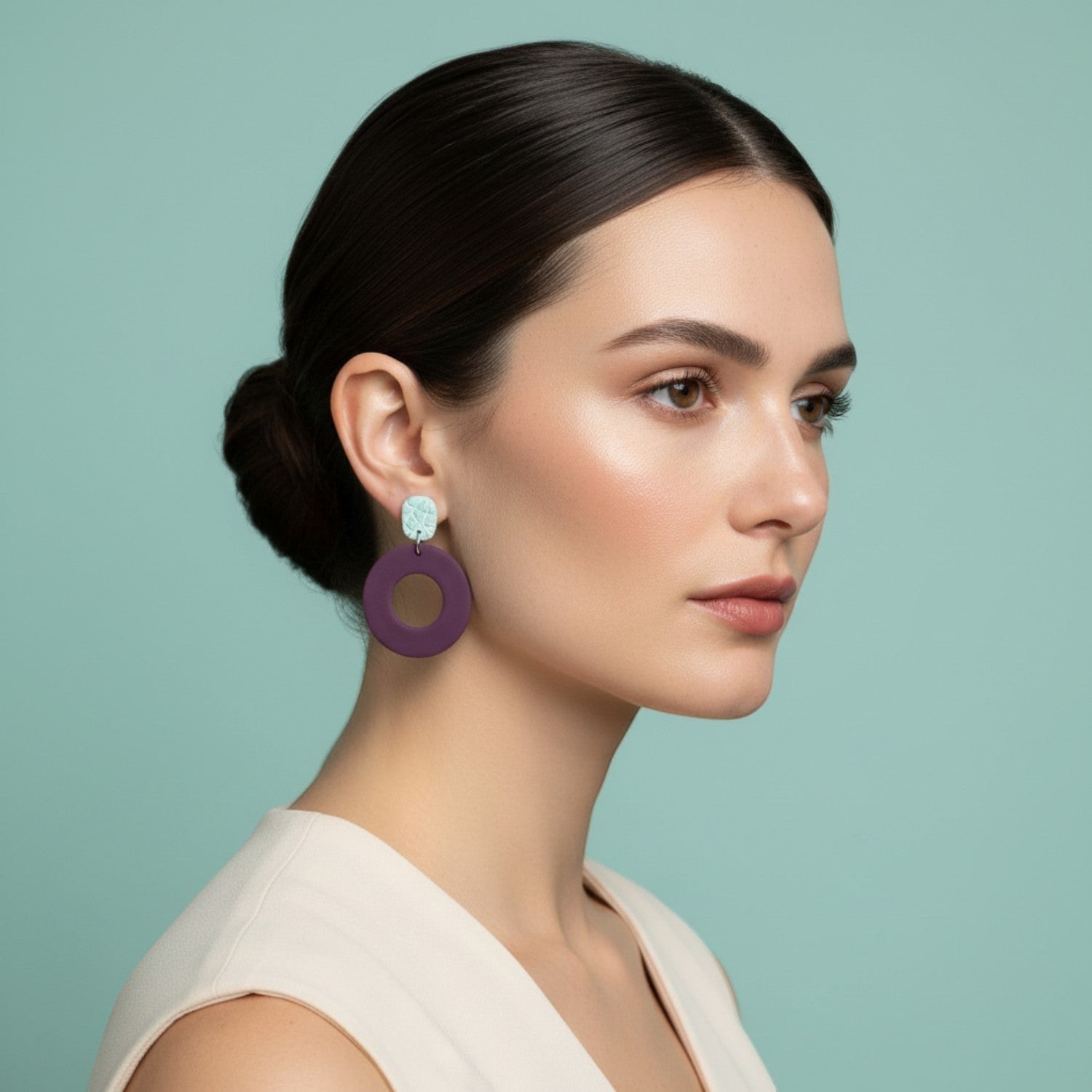 Ziolla Designs plum circular polymer clay earrings with silver leaf-accented studs. Lightweight, nickel-free, and handmade.