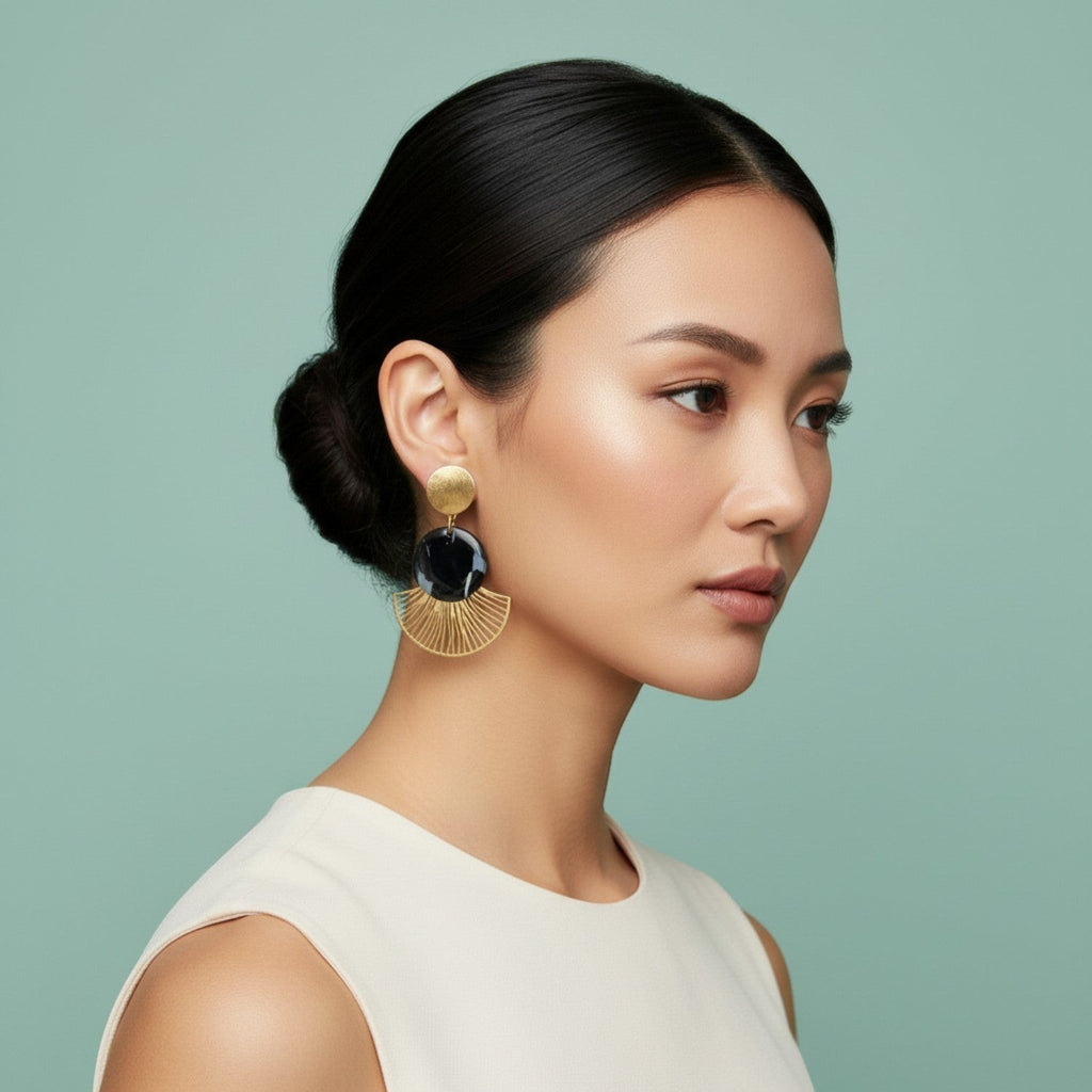 Ziolla Designs Roberta earrings: black marbled resin disc with brushed gold stud and fan detail. Art Deco style.