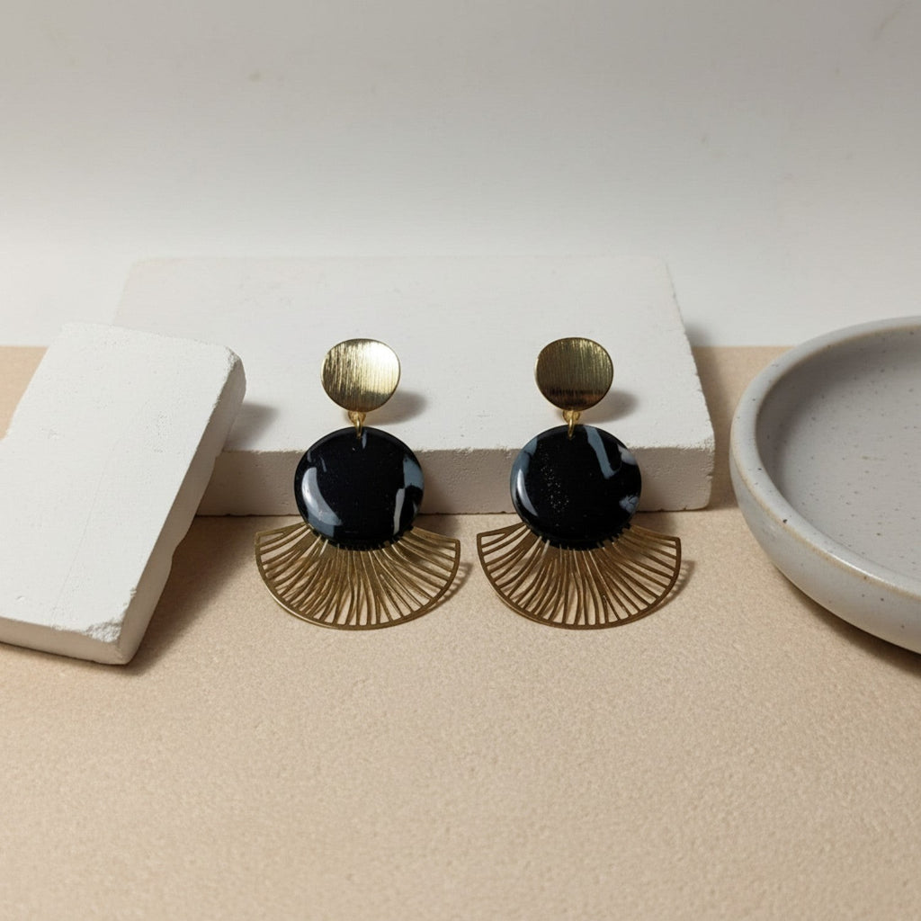 Ziolla Designs Roberta black marbled resin disc earrings with gold fan detail. Art Deco style statement drops.